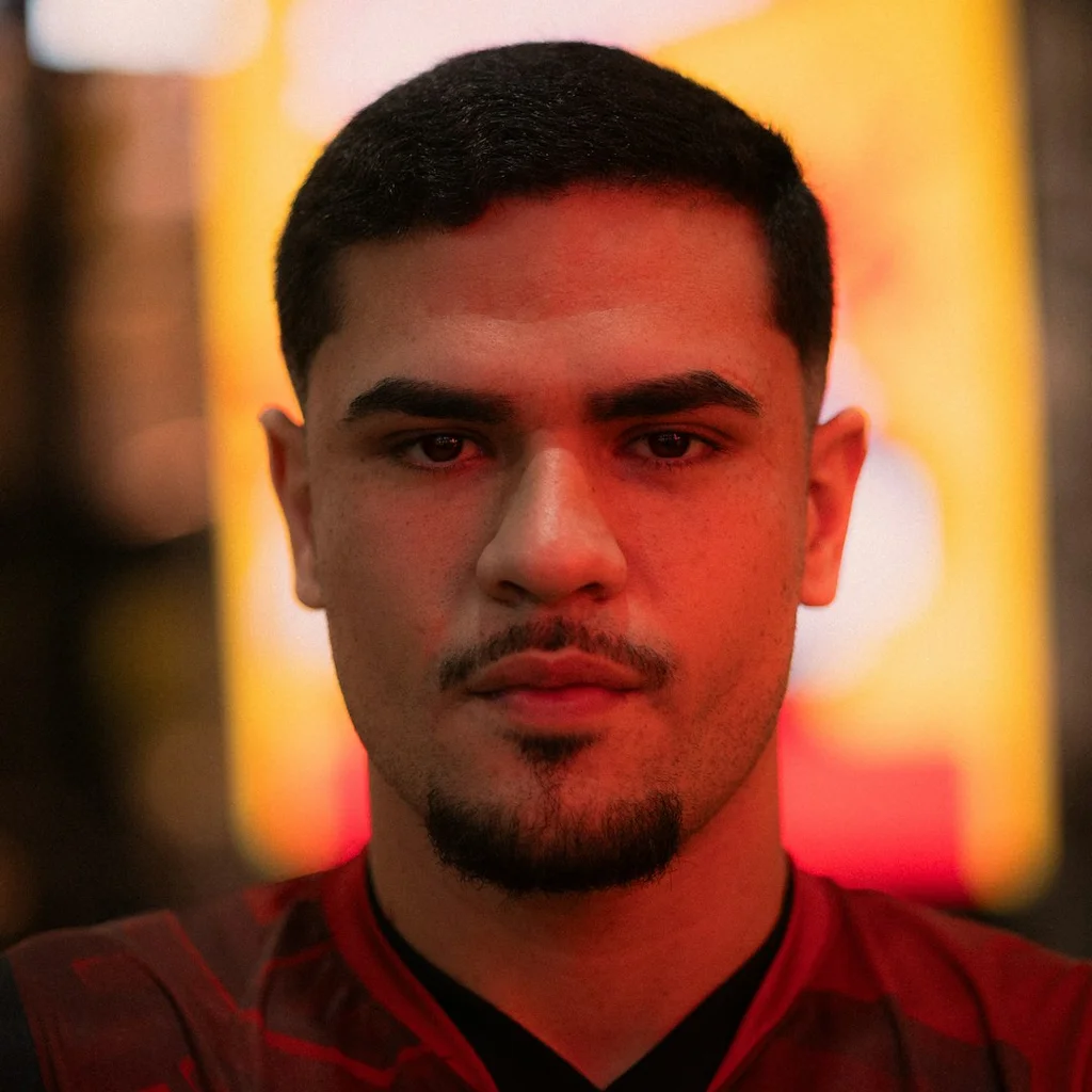 Man with beard and mustache looking forward. - esports